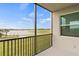 Screened balcony offering stunning views of the lake and golf course at 12140 Wellen Golf St # 202, Venice, FL 34293