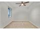 Bedroom with a carpet and ceiling fan at 12140 Wellen Golf St # 202, Venice, FL 34293