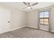 Neutral bedroom with ample carpet space, a large window, and light-colored walls at 12617 Oak Hill Way, Parrish, FL 34219