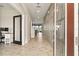 Inviting entryway features wood-look tile floors and provides views to an open living space and access to a home office at 12617 Oak Hill Way, Parrish, FL 34219