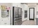 Stylish kitchen with stainless steel refrigerator and appliances, and ample storage space at 12617 Oak Hill Way, Parrish, FL 34219