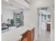 Open living space with a wine rack and access to the backyard patio at 1345 Reserve Dr, Venice, FL 34285