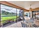 Outdoor patio features a table and chairs, perfect for enjoying the scenic lake views at 1345 Reserve Dr, Venice, FL 34285