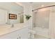 Well-lit bathroom with tub, shower, and modern vanity at 137 Hercules Dr, Rotonda West, FL 33947