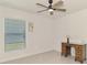Bedroom featuring natural light, a ceiling fan, and neutral tones at 137 Hercules Dr, Rotonda West, FL 33947