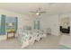 Inviting bedroom with a large window and a ceiling fan at 137 Hercules Dr, Rotonda West, FL 33947
