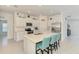 Bright kitchen featuring white cabinets, stainless steel appliances, and a quartz countertop at 137 Hercules Dr, Rotonda West, FL 33947