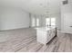 Bright and open kitchen with a center island and modern appliances at 137 Mariner Ln, Rotonda West, FL 33947