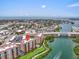 Expansive aerial shot of condos near a waterway offering stunning residential views at 157 Tampa E Ave # 305, Venice, FL 34285
