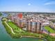 Wide aerial view showing the condo complex with the waterway and beautiful surroundings at 157 Tampa E Ave # 305, Venice, FL 34285
