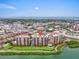 Panoramic aerial showcasing condos with a waterway, city and community pool at 157 Tampa E Ave # 305, Venice, FL 34285