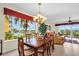 Dining area with large windows that bring in the beauty of the water at 157 Tampa E Ave # 305, Venice, FL 34285