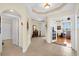 Grand foyer with tile flooring, neutral walls, and access to multiple living areas at 157 Tampa E Ave # 305, Venice, FL 34285