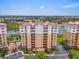 Stunning building view, showing landscaping, pool, and boat dock at 157 Tampa E Ave # 305, Venice, FL 34285