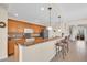Modern kitchen featuring granite countertops, stainless steel appliances, and bar seating at 157 Tampa E Ave # 305, Venice, FL 34285