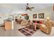 Open-concept living area and dining area with views of the water at 157 Tampa E Ave # 305, Venice, FL 34285