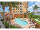 Resort style pool area with ample seating and scenic views of the river at 157 Tampa E Ave # 305, Venice, FL 34285
