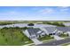 Stunning aerial view of a pristine home near a tranquil lake and lush surroundings at 18136 Foxtail Loop, Venice, FL 34293