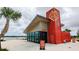 Exterior of the community clubhouse by the lake; offering boat and kayak rentals at 18136 Foxtail Loop, Venice, FL 34293