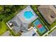 An aerial view of the pool and tennis court, highlighting the community amenities at 19927 Bridgetown Loop, Venice, FL 34293