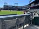 Seating area in the ballpark with barstools and a view overlooking the field at 20169 Cristoforo Pl, Venice, FL 34293