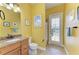 Bathroom with granite countertop vanity and door leading to screened pool at 20169 Cristoforo Pl, Venice, FL 34293