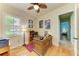 This office features a wooden desk, a comfortable chair, a printer, and decor, making for a productive work environment at 20169 Cristoforo Pl, Venice, FL 34293