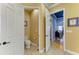 This powder room with white fixtures features tile flooring and is conveniently located near the main living areas at 20169 Cristoforo Pl, Venice, FL 34293