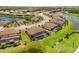 Aerial shot showcasing a community with beautiful lakes at 20443 Cristoforo Pl, Venice, FL 34293
