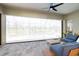 Covered patio featuring comfortable seating and access to screened pool at 20443 Cristoforo Pl, Venice, FL 34293