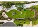 Aerial view of community playground with modern equipment at 20443 Cristoforo Pl, Venice, FL 34293