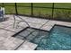 Pool stairs and railings for easy access and safety at 20443 Cristoforo Pl, Venice, FL 34293