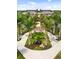 Beautiful Wellen Park town center with landscaped walkways, seating areas, and inviting architecture at 20443 Cristoforo Pl, Venice, FL 34293