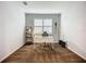 Bright office space with carpet, white desk, and natural light from the window at 20749 Swallowtail Ct, Venice, FL 34293