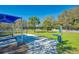 Well-equipped dog park with benches, a shade structure, and dedicated play areas for furry friends at 21641 Winter Park Ct, Venice, FL 34293