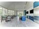 Bright kitchen with an island, stainless appliances, and a seating area with lots of natural light at 21641 Winter Park Ct, Venice, FL 34293