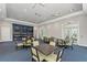 Community library featuring tables, chairs, and bookcases at 21641 Winter Park Ct, Venice, FL 34293