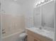Bathroom with a tub and shower combination, a vanity, and a toilet at 2204 L Pavia Blvd # 2204, Venice, FL 34292