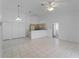 Bright open-concept living space, kitchen, and large closets at 2204 L Pavia Blvd # 2204, Venice, FL 34292