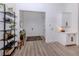 Bright entryway featuring a modern design with light wood floors and stylish decor elements at 2245 Pickard Ln, North Port, FL 34286