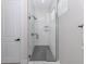 Bright glass shower with marble tiling and black fixtures at 2245 Pickard Ln, North Port, FL 34286