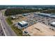 Commercial area with a mix of retail buildings, parking lots, and busy roads at 2355 Allsup Ter, North Port, FL 34286