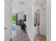 Hallway leading to bedrooms and play room at 2355 Allsup Ter, North Port, FL 34286