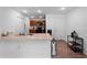 Functional kitchen featuring a breakfast bar, sleek appliances, and abundant storage space at 2355 Allsup Ter, North Port, FL 34286