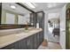 This bathroom features a double sink vanity with modern fixtures at 239 Cutter Ct, North Port, FL 34287