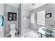 Modern bathroom with updated toilet and shower at 2445 Apache St, Sarasota, FL 34231