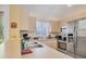 Practical kitchen design with stainless steel appliances, sink, and a window view at 2445 Apache St, Sarasota, FL 34231
