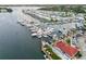 Aerial view of boat marina with various boats, docks, and waterfront amenities at 250 Santa Maria St # 314, Venice, FL 34285