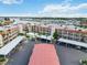 Aerial view of a well-maintained complex near waterways and covered parking at 250 Santa Maria St # 314, Venice, FL 34285