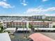 Top-down shot shows the layout of the apartment complex and the boat marina at 250 Santa Maria St # 314, Venice, FL 34285